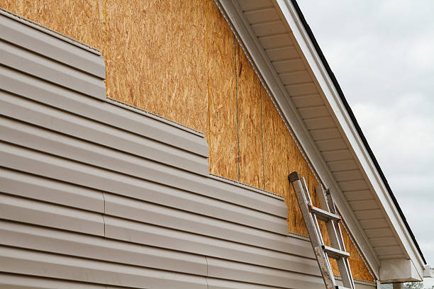 Professional Siding Contractor technician working in East Fultonham, OH